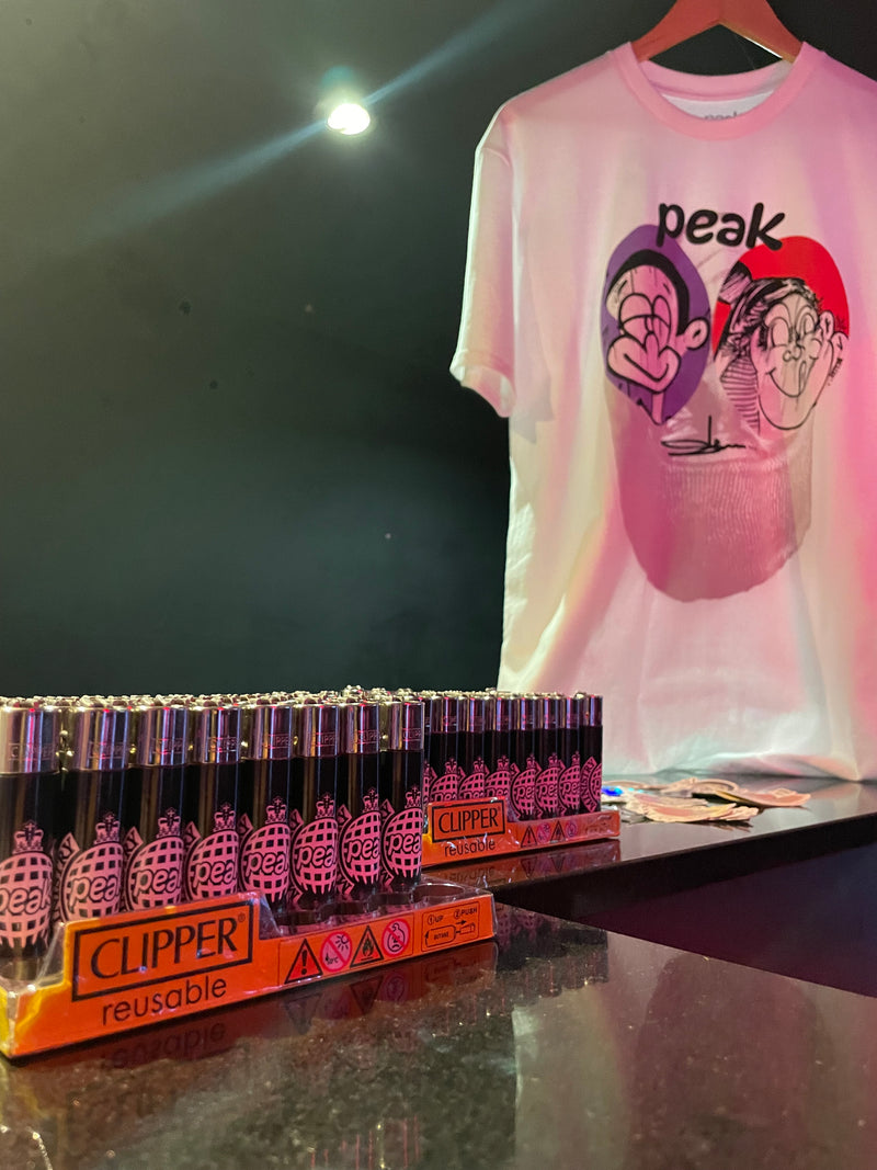 the peak x ministry of sound lighters at the merch stand at the ministry of sound event