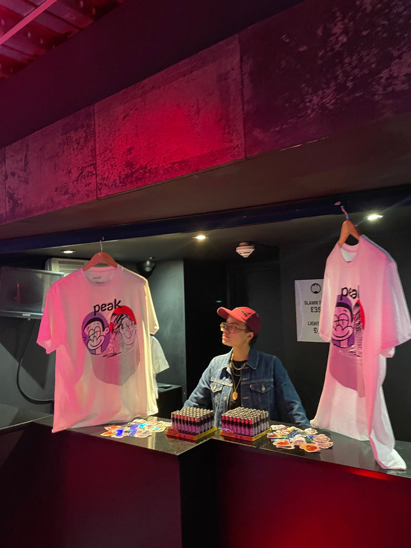 the merch stand at the peak x ministry of sound event